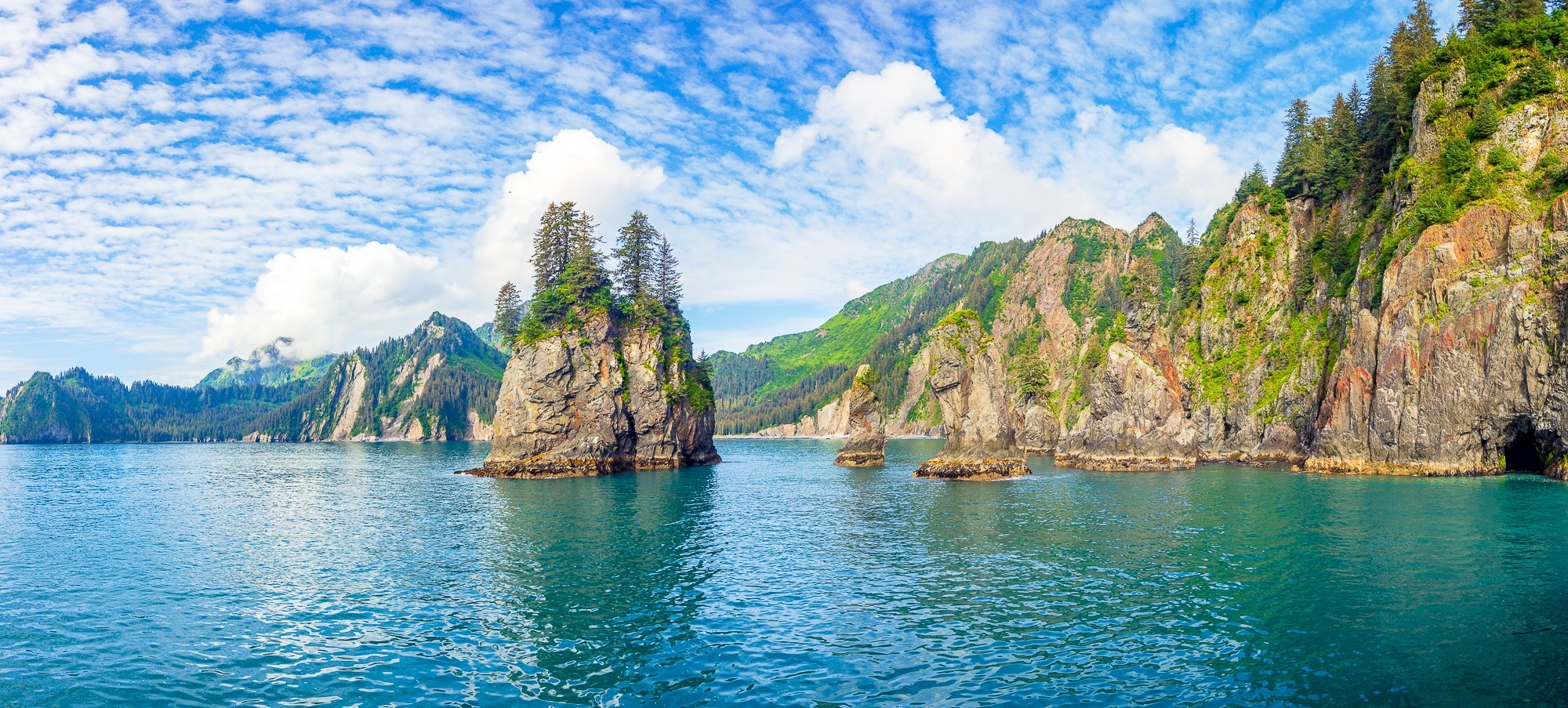 Kayaker exploring fjords in Kenai Fjords National Park 